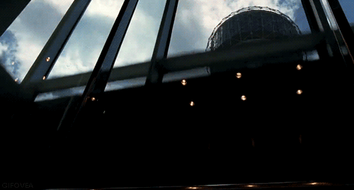 Moving image of a glass elevator going up to depict the 10th house being at the top pf the astrology chart