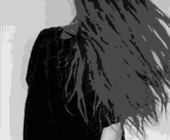 Black and white gif of a girl with long dark hair, in a black t-shirt, seen from behind as she gathers her hair into an updo — representing self-image and the 1st house in astrology.